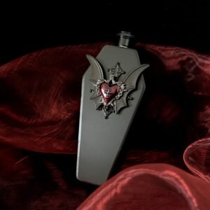 Blood Moon Gothic stainless steel hip flask with crimson heart and bat ornament on red satin